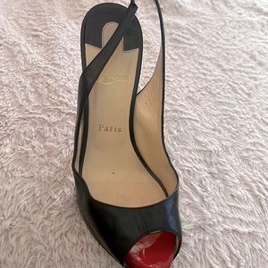 One Christian Louboutin black sling back high heel size 38